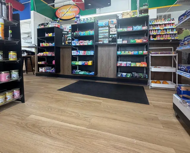 New checkout counter and display shelving inside the finished store